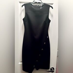 Tommy Hilfiger black zippered dress with silver detailing. Size 6.